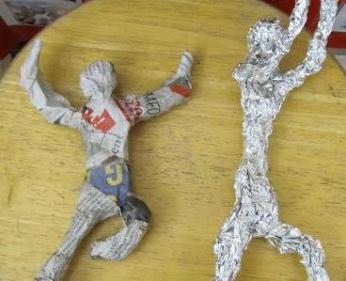 Action figure sculptures of aluminum foil